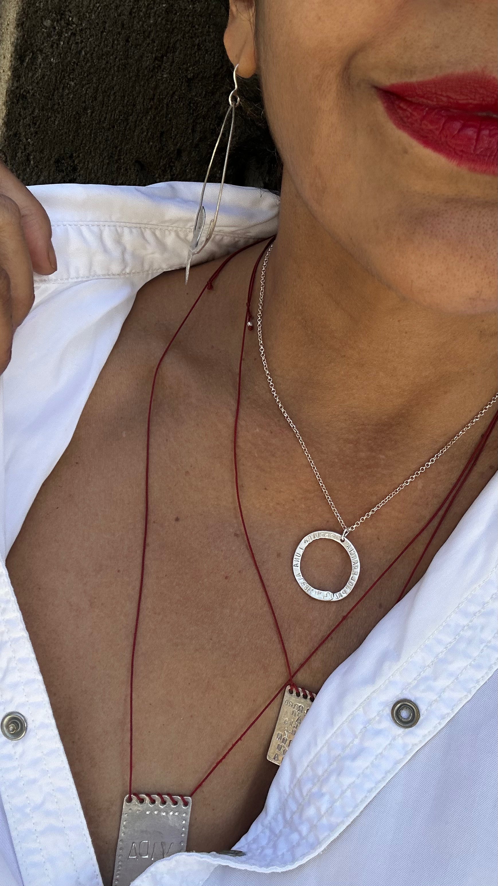 Amuleto círculo abierto