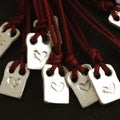 BABY Amuletos, mis amuletos te los puedo hacer con una palabra de máximo 4 letras.